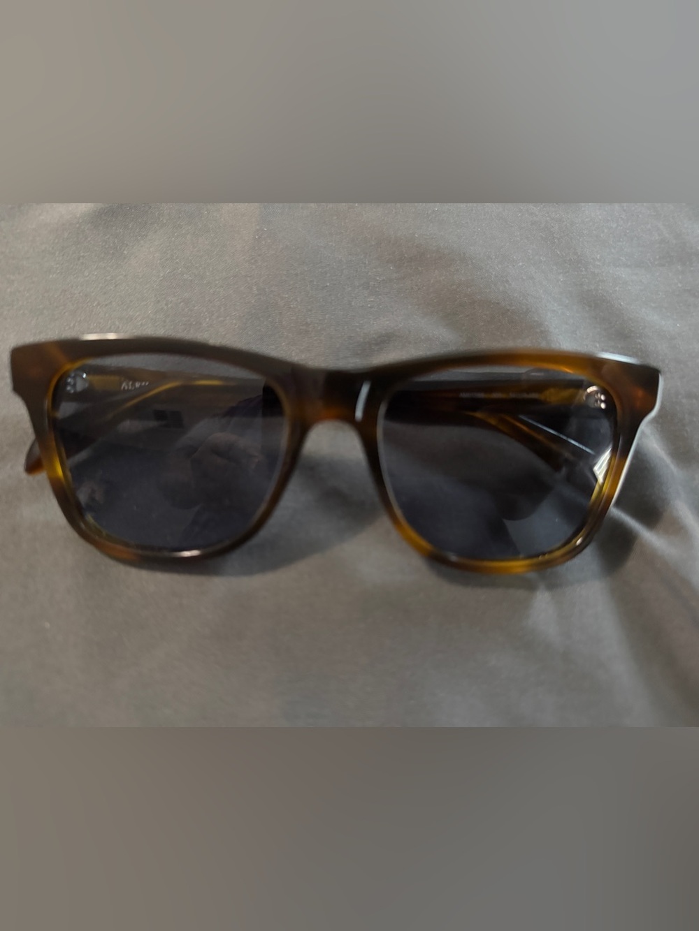 Alexander McQueen AM0158S is a unisex square-rectangle acetate sunglass